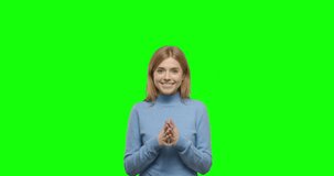 Surprised girl laughing. Happy smiling young pretty woman having fun on Green Screen, Chroma Key/ 4k video footage slow motion 60 fps