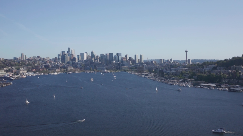 Boats and Sailboats in Water of South Lake Union on Sunny Day With Overview on Seattle Downtown Cityscape Static Aerial