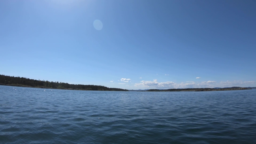 Shoreline view from a motorboat