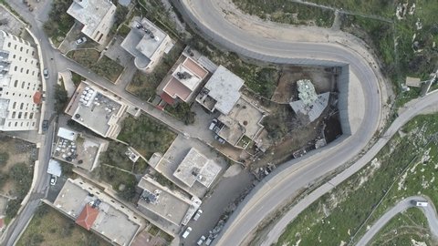 Aerial footage of the separation wall between Israel and the Palestinian Authority in Jerusalem