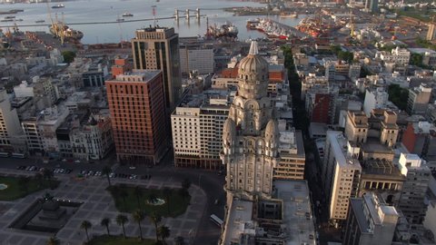 Montevideo, Uruguay, aerial view of cityscape showing the Old City and Independence Square at sunset.