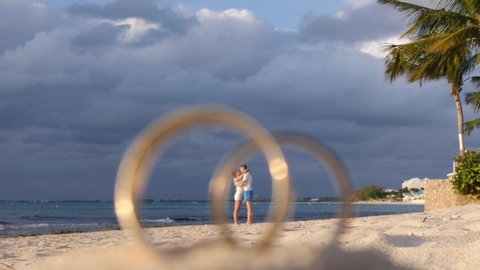 Honeymoon couple on Seven Mile Beach, Cayman Islands