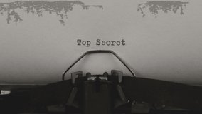 close-up typing a quote top secret, old vintage typewriter with a sheet of paper - Powered by Shutterstock - Get 15% off with code: PIKWIZARD15