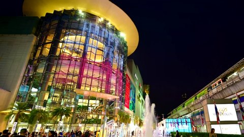 Bangkok, Thialand - January 1,2020:Peoples visit Siam Paragon, is one of the most popular shopping malls is famous with color of light of fountain outdoor and Biggest Shopping Center in Thailand