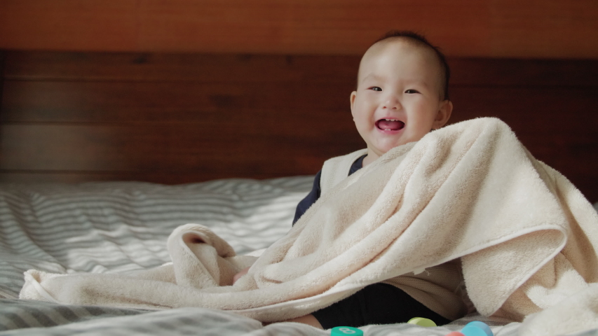 Beautiful Smiling Baby Sitting On The Blanket Stock Photo Image Of