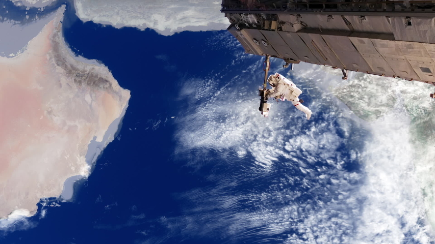 The International Space Station at 410 km (254 mi) in orbit around Hearth. Daytime face during the rotation movement of planet Earth with a space shuttle flying over the atmosphere.
