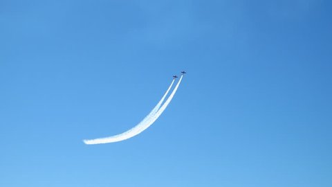 Airplane flying in an acrobatics exhibition
