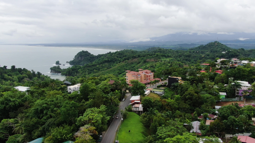 Exotic getaway town of Quepos in Costa Rica, coastal landscape in background