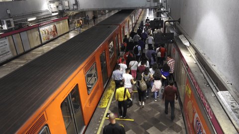 Mexico, Mexico City- 22 january 2020:top view of the arrival and departure of subway trains at a Mexico City station,accelerated scene