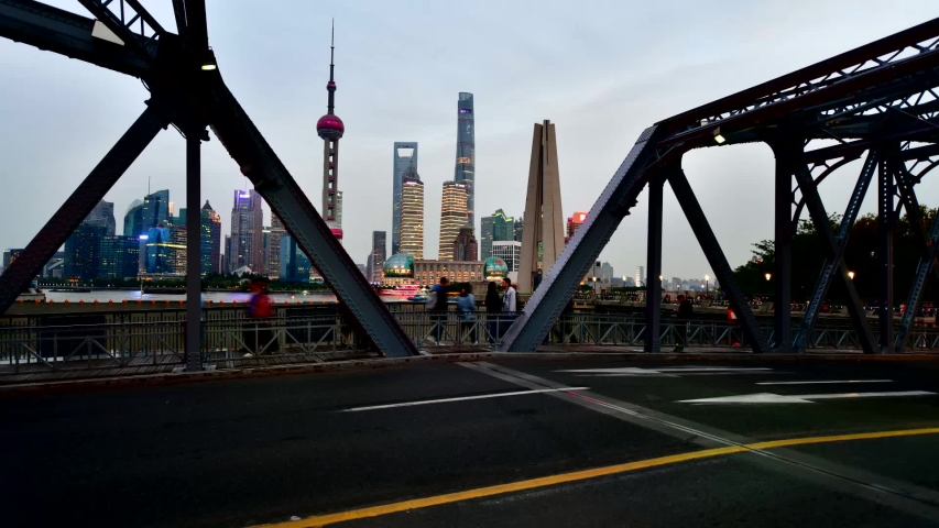Time lapse beautiful cityscape in twilight of Shanghai and Waibaidu bridge at China Royalty-Free Stock Footage #1044286987