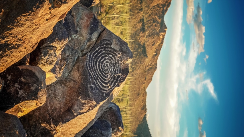 Native American Indian spiral petroglyph at Signal Hill in Saguaro National Park, Arizona, vertical video, slow zoom in