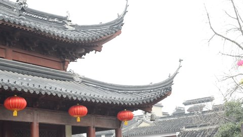 Confucius statue. Text on the pavilion translating into English is Dacheng Hall. Located in Nanjing Confucius Temple, Nanjing, Jiangsu, China.