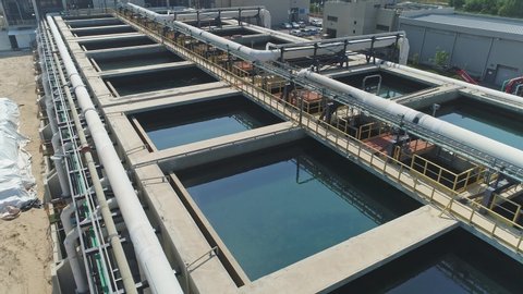 Aerial footage of a large scale waste water recycling and treatment facility