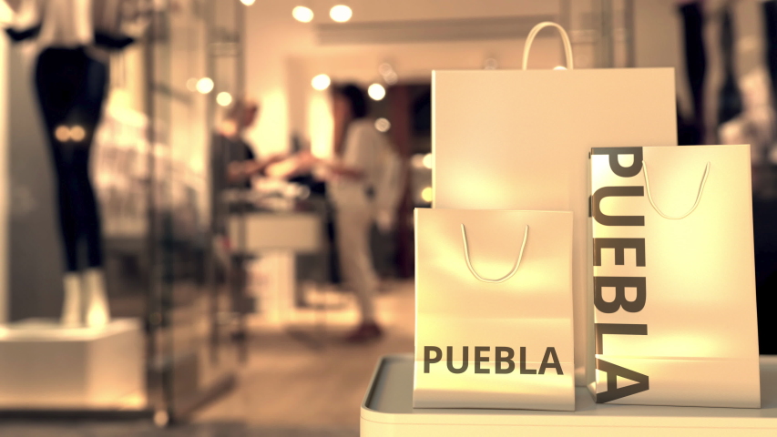 Bags with Puebla text. Shopping in Mexico related 3D animation