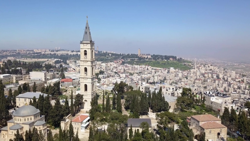 Aerial footage of a large church tower in old city Jerusalem