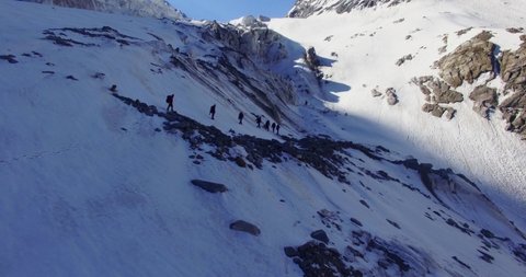 Himalayan mountaineers at Himalaya peak. Snow mountain of Himalayas. Trekking in Himalayas mountain peaks. Beautiful ice or snow mountains peaks of Himalayas. Mountaineers trekking. Ice craft.