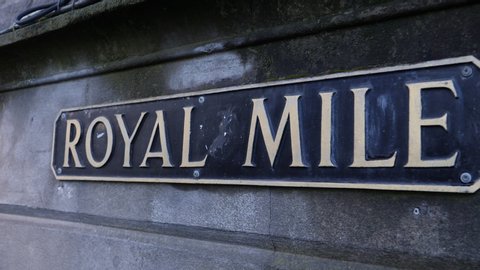 Close up of The Royal Mile Street sign in Edinburgh, Scotland. The most famous street in Scottish history. UK Travel & Tourism