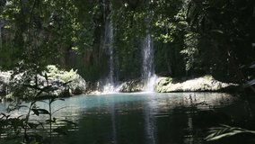 Kursunlu waterfall and the turquoise lake