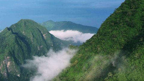 Aerial view of mountains and river Nong Khiaw. North Laos. Southeast Asia. Video made by drone from above. Bird eye view.