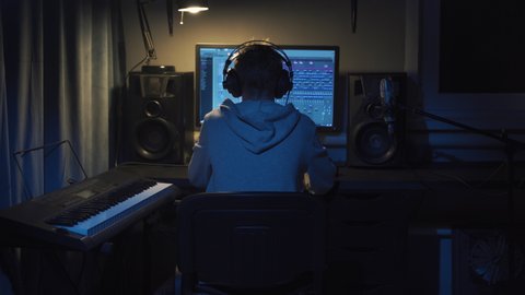 Teenager at Home Composes Music In His Home Sound Studio