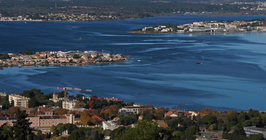 Sète, Hérault department,Occitanie, France. The etang de Thau. On the left side is the Pointe du Barou. On the right side is the town named Balaruc-les-Bains  .