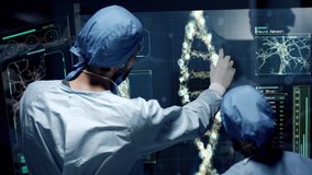 Professional Doctors Analyzing DNA Structure, genes and genetic disorders, science. DNA Strand molecule close up animation with infographics on futuristic transparent screen. - Powered by Shutterstock - Get 15% off with code: PIKWIZARD15