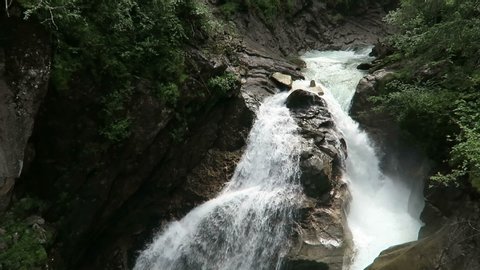 Krimml Waterfalls in Salzburger Land Austria. National Park of High Tauern mountain range.