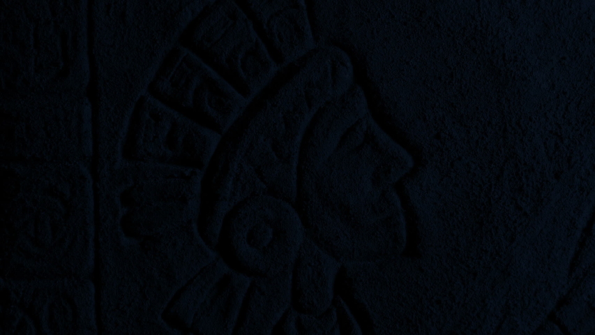 South American Man Carving Lit Up With Fire