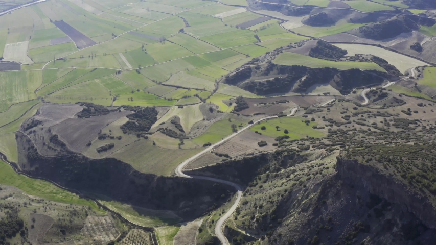 Vast Field and Hill Aerial View