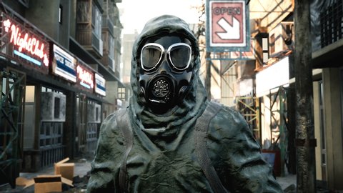 A stray man in military protective clothing and a gas mask is walking through the ruined city. The concept of a post-Apocalyptic world after a nuclear war.