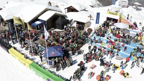 Sochi, Russia - 01.01.2020 Aerial photography video. Men and women rest in the restaurant at the top of a snowy mountain. The event is outdoors. Winter. A lot of people in one place. quiksilver 