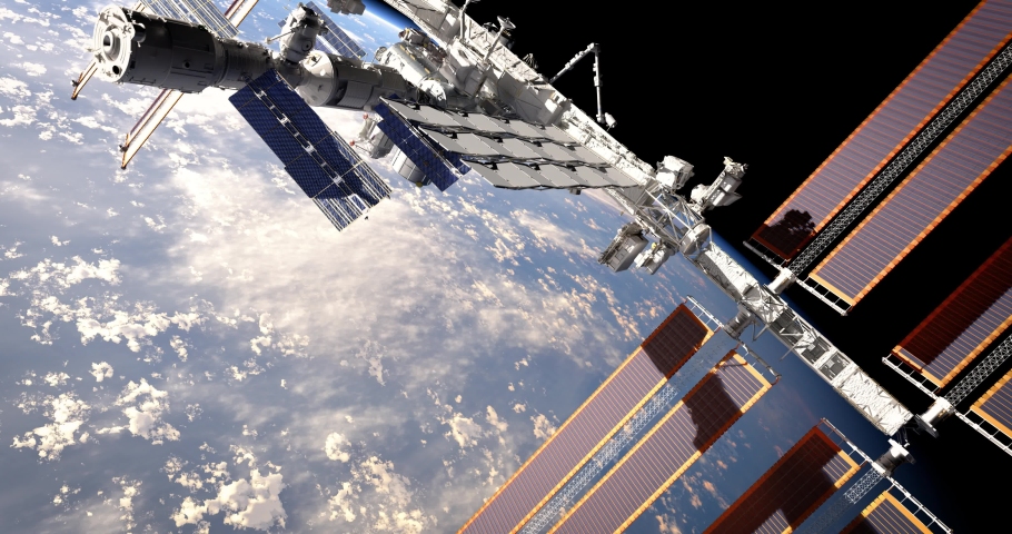 Flight of International Space Station ISS orbiting the blue marble planet Earth. Fly above the planet atmosphere. 3D animation. Elements of this image furnished by NASA. Royalty-Free Stock Footage #1044421276