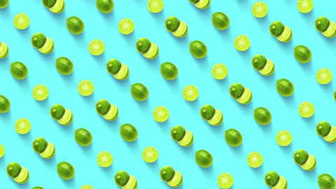 Animated diagonal lime pattern on electric blue background. Minimal flat layout style. Top down view. Pop art design, creative summer food concept. 