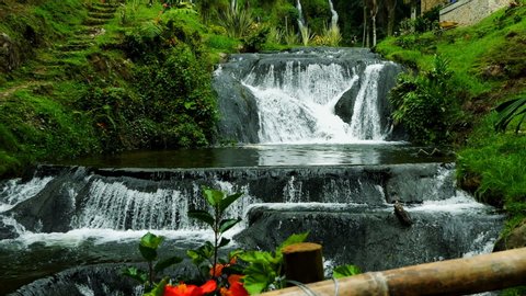 Waterfalls Slow motion at Santa Rosa de Cabal, Colombia. Beautiful Waterfall inside the forest. Cascade in a green Mountain. Epic Waterfall in slow motion. Natural beauty background. Ecology Concept.