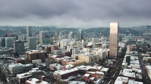 An aerial hyperlapse footage of Portland downtown and the bridges over the river