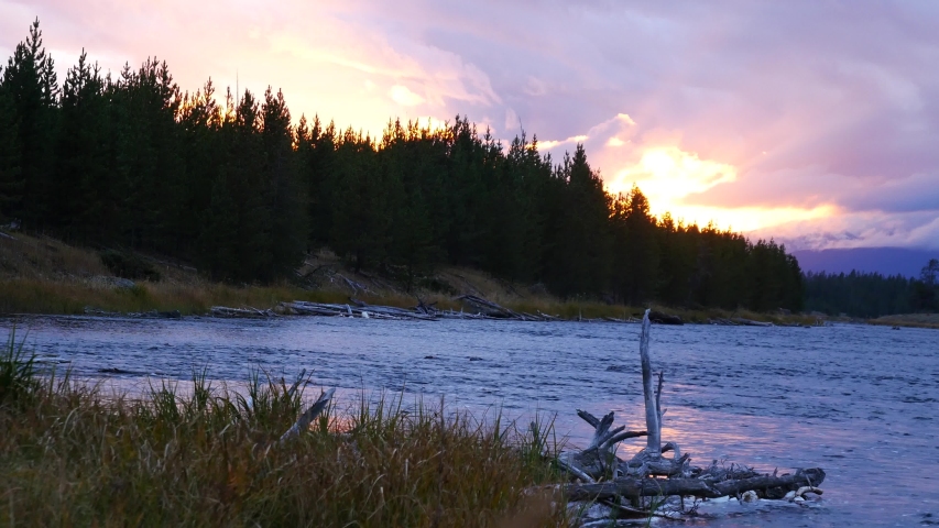 Sunset along the Madison River in Yellowstone National Park (Wyoming).