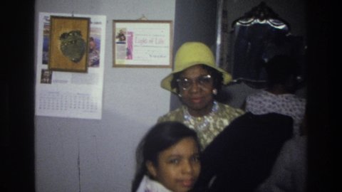 HARLEM NEW YORK USA-1976: Grandma Picking Up After Grand Kids At Sunday Service