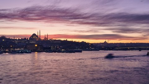 Beautiful sunset panorama timelapse and evening time in Istanbul, Turkey. Time lapse clip includes Suleymaniye mosque, Halic (Golden Horn), and Eminonu region.