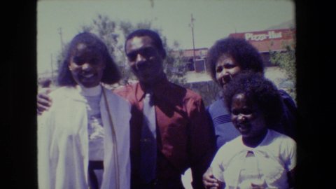 LANSING MICHIGAN -1983: A Black Family In Sunday Wear Pose For Some Pictures