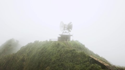 Aerial shot Haiku Stairs (Stairway to Heaven) Abandoned Radio Tower in the Clouds