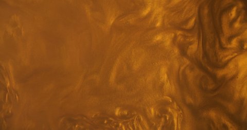 Liquid gold wave background. Golden and abstract backdrop that suits as lava honey or oil
