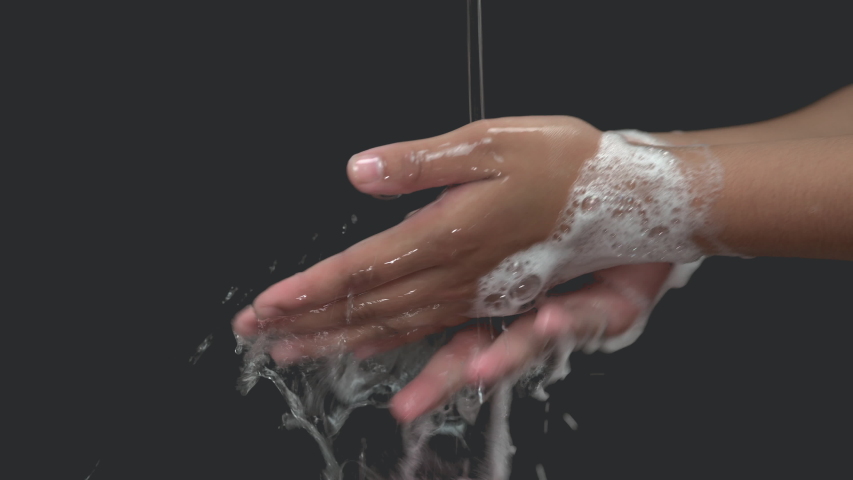Close up of female lathering hands with soap before washing 
 | Shutterstock HD Video #1044579097