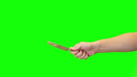Hand enter and exit Green Screen Chroma key with Stainless steel silver Kitchen Butter Knife cutting and Horror stabbing