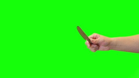 Hand enter and exit Green Screen Chroma key with Stainless steel silver Kitchen Butter Knife elegant cutting