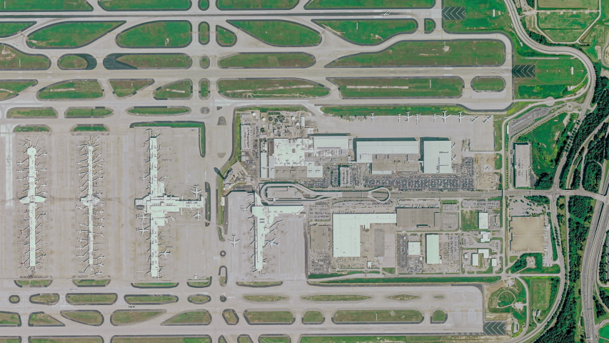 Aerial view of Atlanta International Airport with the aircraft, the terminal building and runway. The Atlanta, Georgia, airport is the busiest passenger airport in the world.