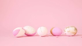 Pink golden confetti drops on decorated pattern egg on a pink background. Minimal holiday concept. Happy Easter card - Powered by Shutterstock - Get 15% off with code: PIKWIZARD15