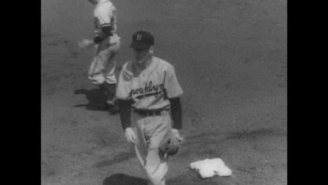 1940s: Baseball field. Pitcher throws ball to base. Shortstop tags player out. Text reads "KIRBY HIGBE."