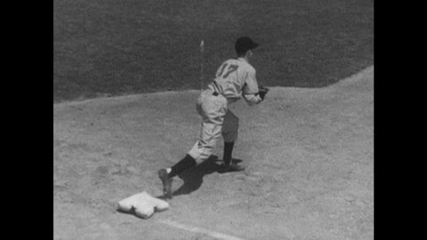 1940s: Caption reads "Catching." Catcher and pitcher communicate through signals. Man throws ball. Captions read "GABBY HARTNETT" and "CARL HUBBELL."