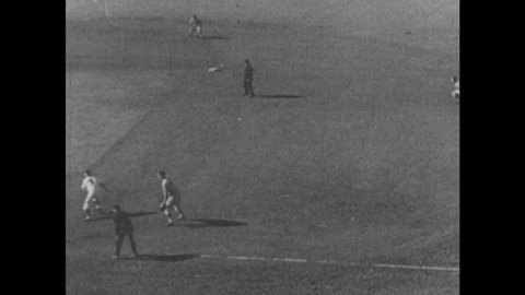 1940s: Baseball game. Players run. Captions read "CARVEL ROWELL" and "EDDIE MILLER." Player tosses ball to teammate. Man tags base. Player slides.