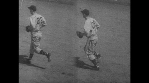 1940s: Men catch ball and tag base. Men throw ball. Player slides into second base.